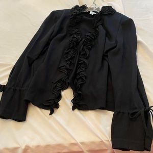 Cute  st john knit jacket size 8ruffles with ties at sleeves  and front